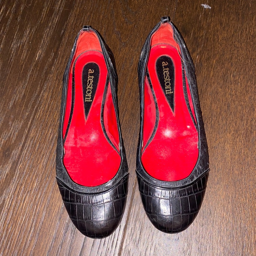 A. Testoni flats